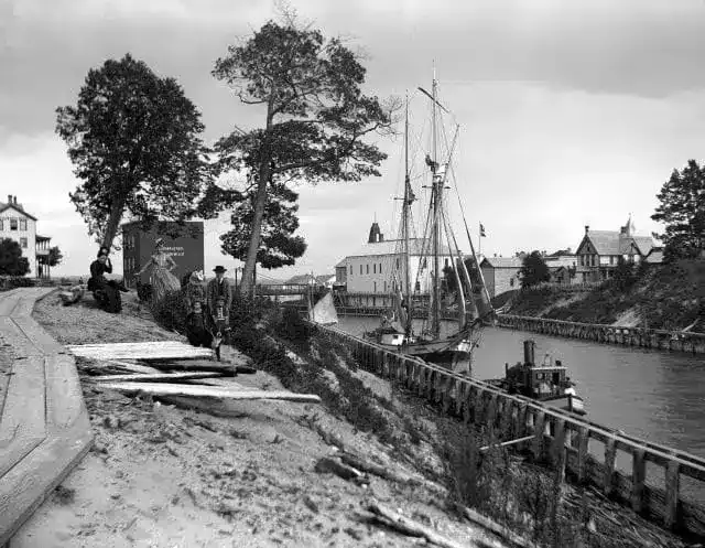 Black and white archival photograph of the Weathervane building on the channel
