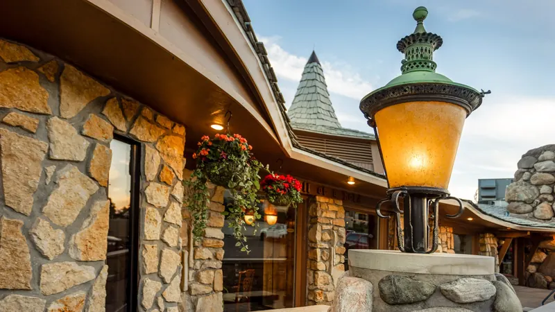 A lantern mounted on the restaurant's fieldstone wall